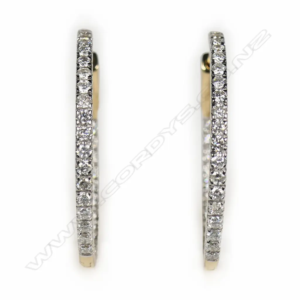 A pair of 14ct gold and diamond hoop earrings, Image 1++