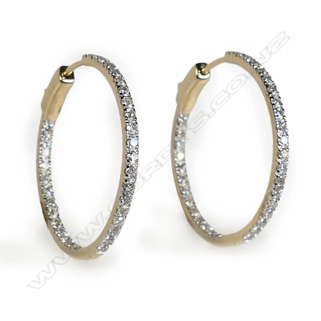 A pair of 14ct gold and diamond hoop earrings, Image 1++