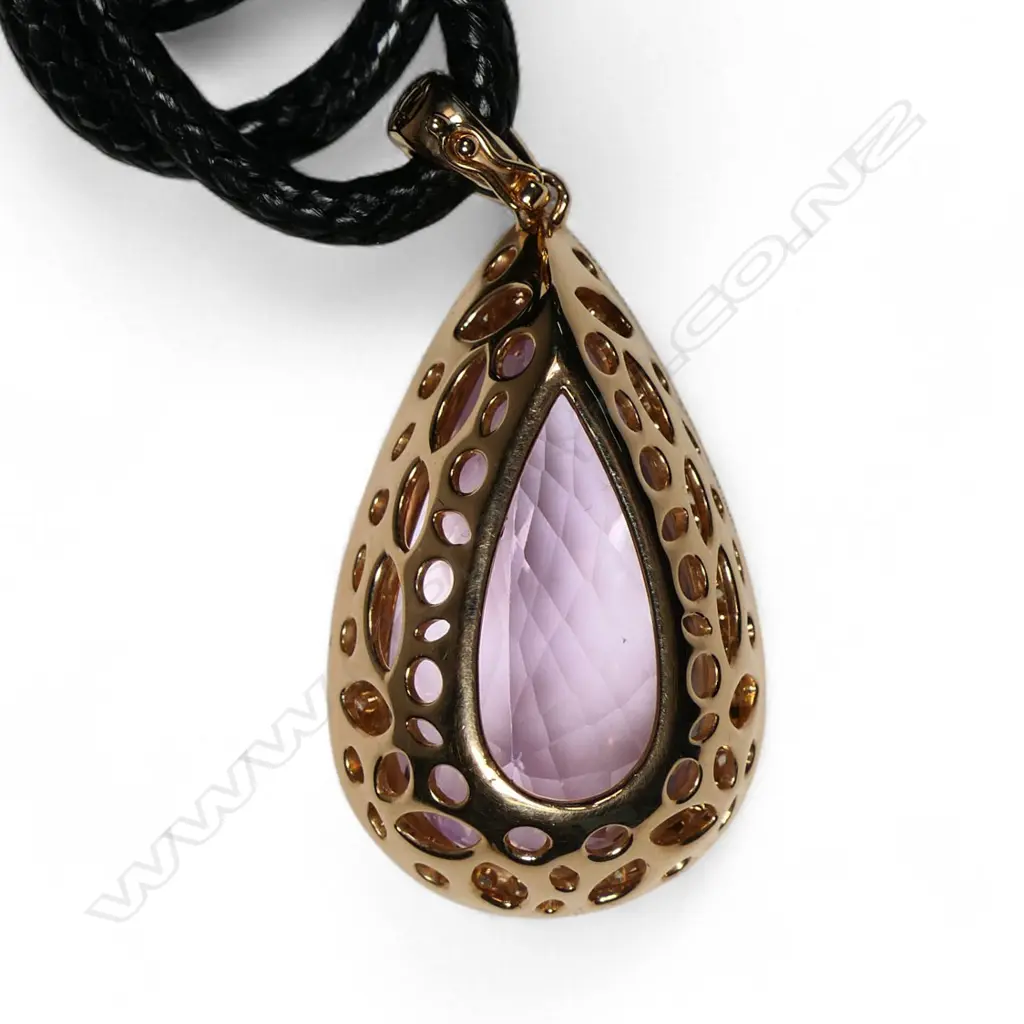 An 18ct rose gold diamond and kunzite pendant, Image 1++