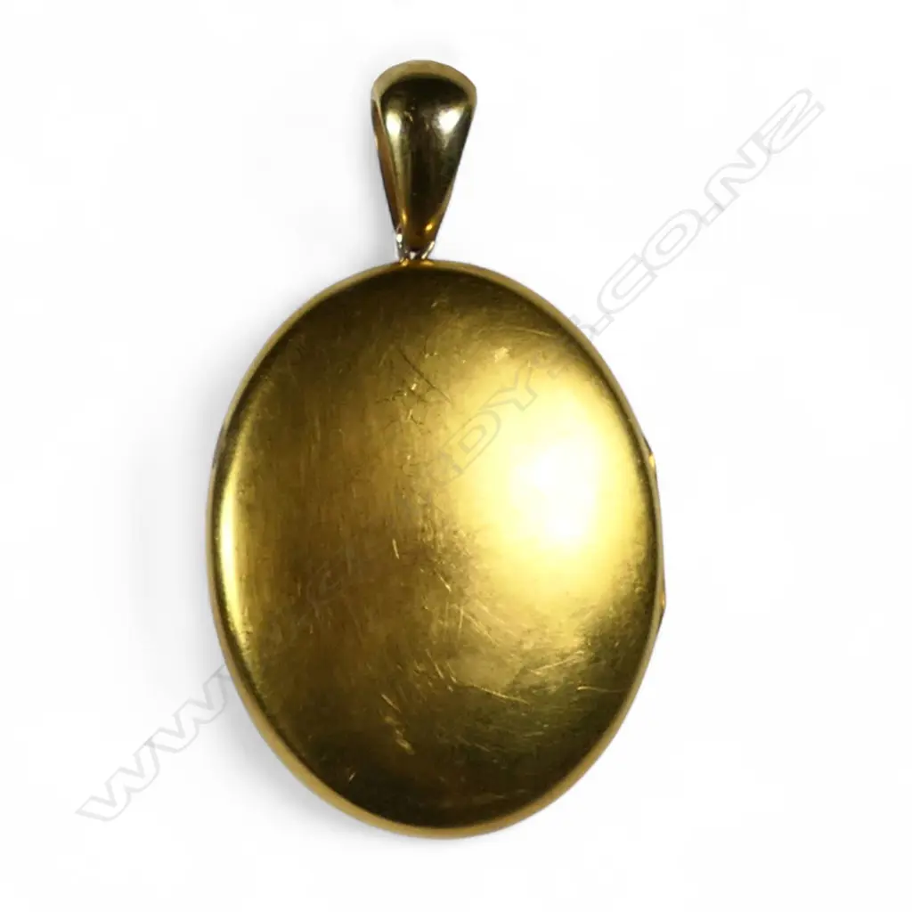 A Victorian 15ct gilded gold locket, Image 1++
