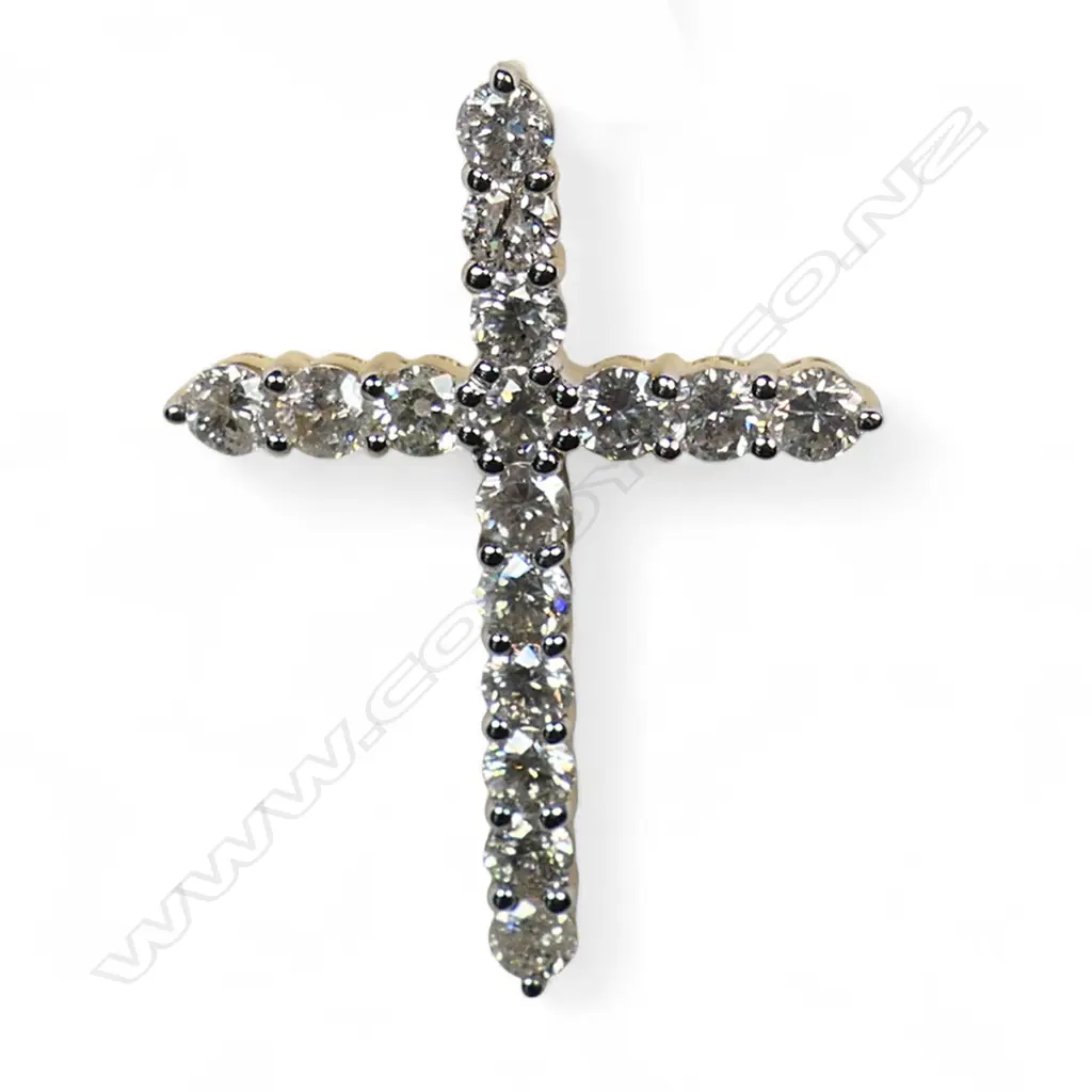 A 14ct gold and diamond set cross pendant, Image 1++
