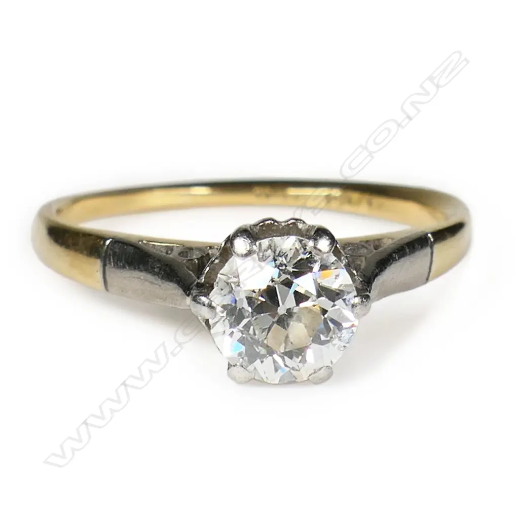 An estate 18ct gold and diamond solitaire ring, Image 1++