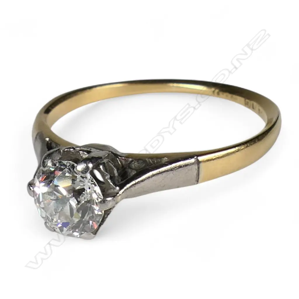 An estate 18ct gold and diamond solitaire ring, Image 1++
