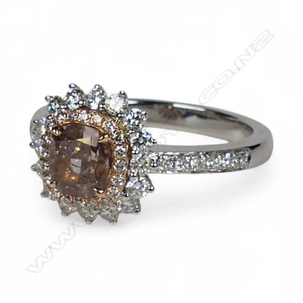 An 18ct white gold and diamond dress ring, Image 1++