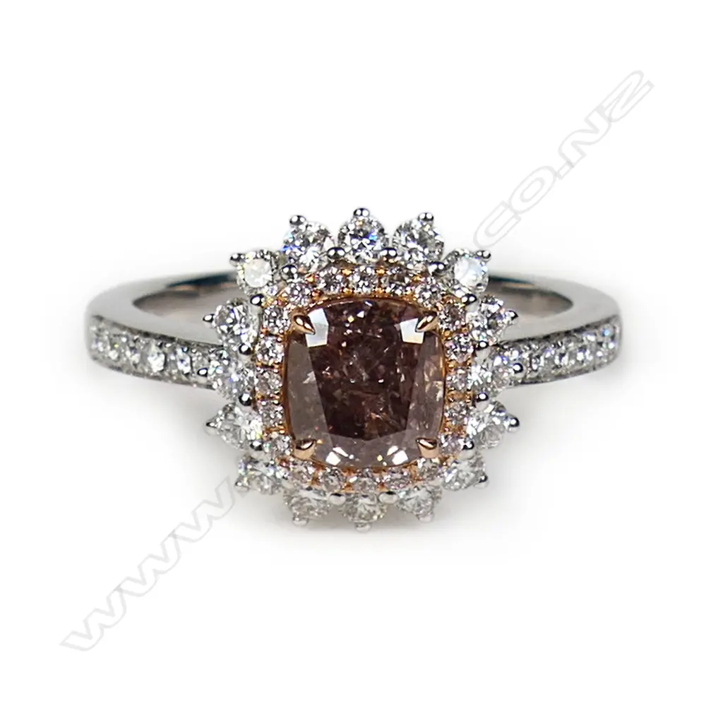 An 18ct white gold and diamond dress ring, Image 1++