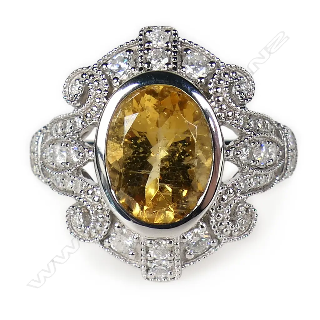 A 14ct white gold golden beryl and diamond antique style ring, Image 1++