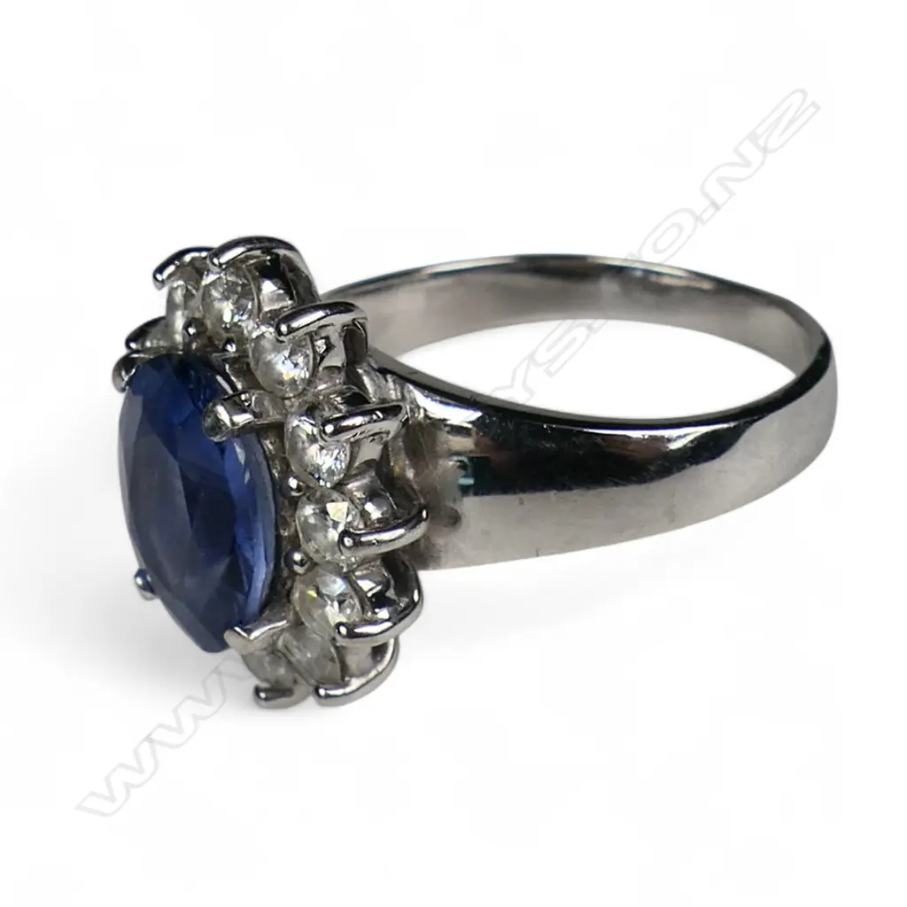 A 14ct white gold sapphire and diamond ring, Image 1++