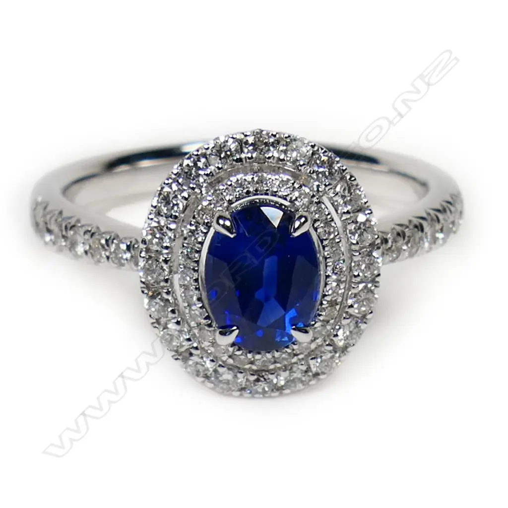 An 18ct white gold sapphire and diamond double halo ring, Image 1++