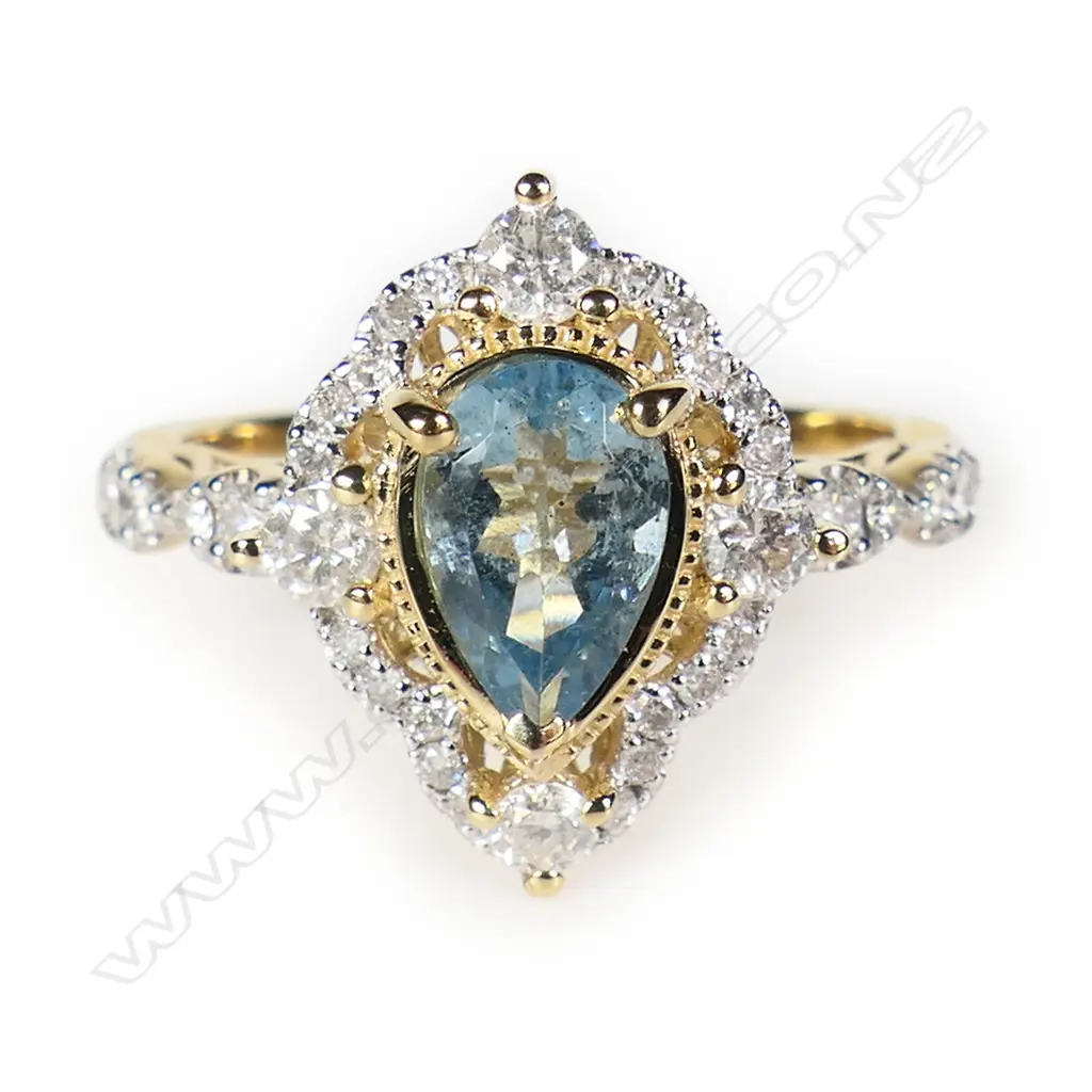 A 14ct gold aquamarine and diamond dress ring, Image 1++