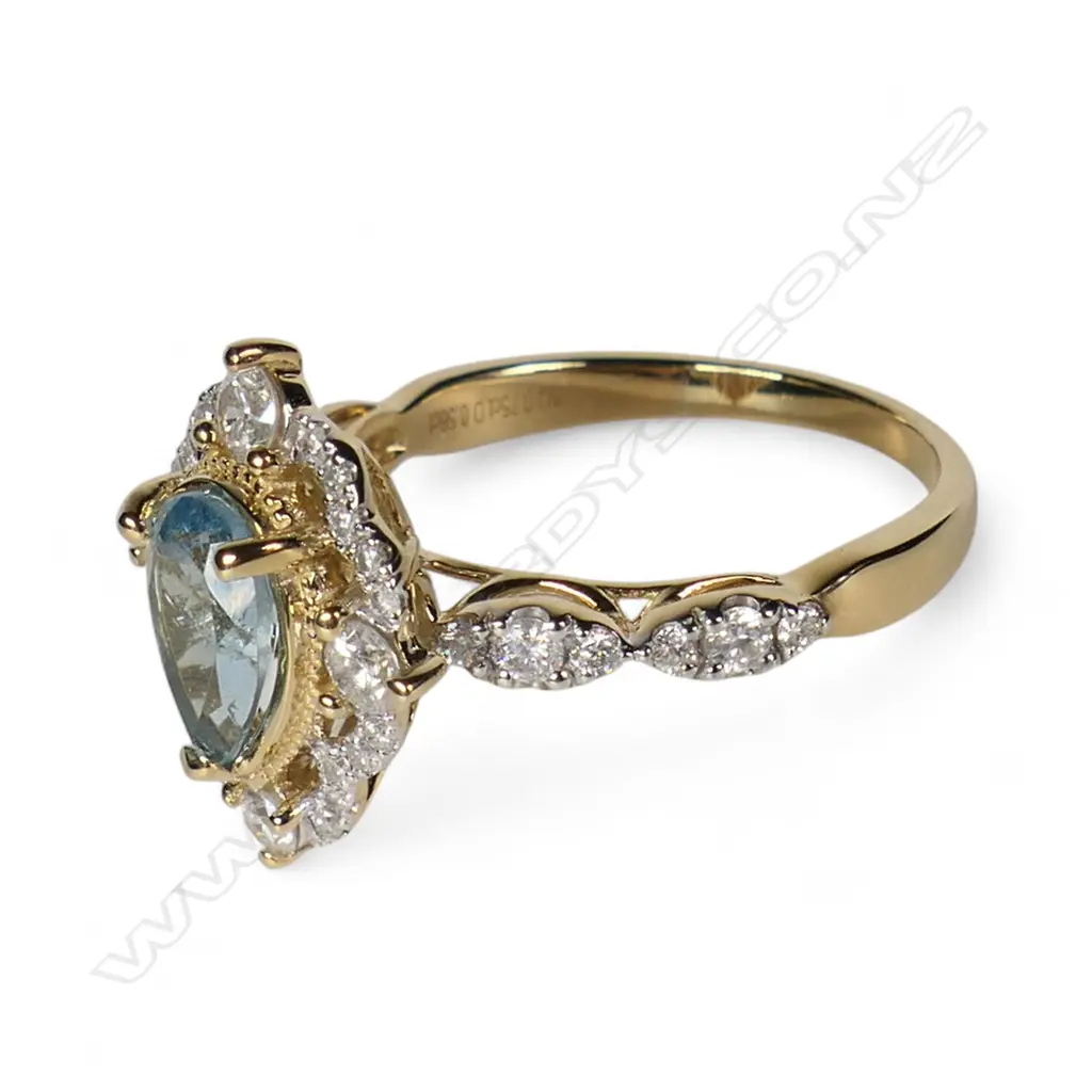 A 14ct gold aquamarine and diamond dress ring, Image 1++