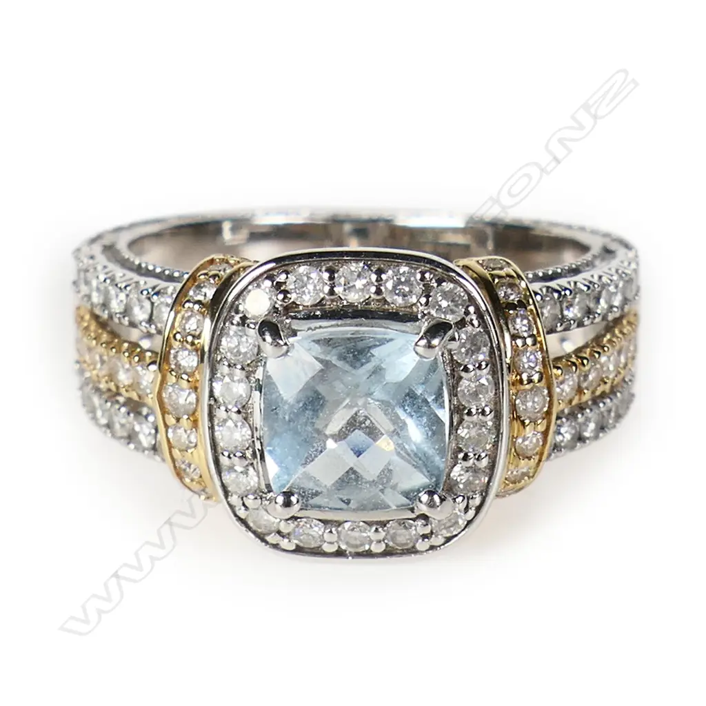 A 14ct yellow and white gold diamond and aquamarine dress ring, Image 1++