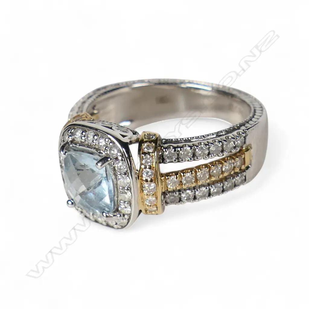 A 14ct yellow and white gold diamond and aquamarine dress ring, Image 1++