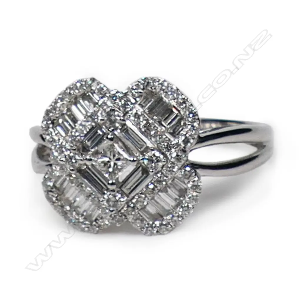 An 18ct white gold and diamond cluster ring, Image 1++