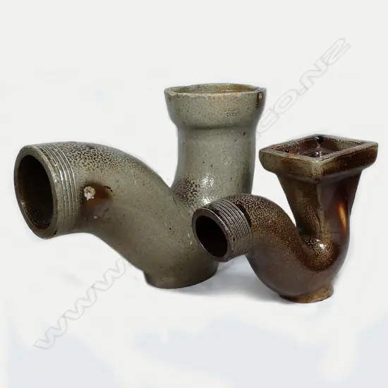 Two colonial salt glaze gully traps