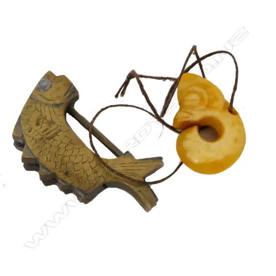 A yellow jade hook type pendant
