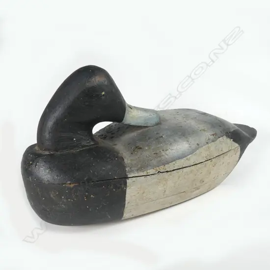 An uncommon 12½" hand-made wooden Blue Bill duck decoy