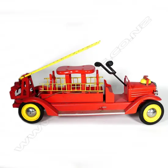 Large scale "Ride-Em" pressed steel toy fire engine aerial ladder truck by Keystone Manufacturing Co. Boston