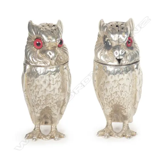 A rare novelty pair of Victorian silver owl pepperettes