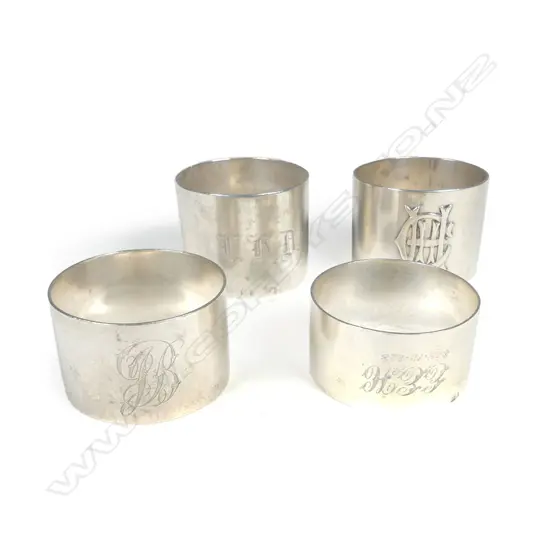 Four N.Z. silver napkin rings each stamped with maker's marks