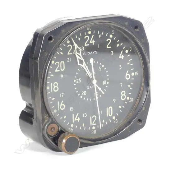 A WWII military Waltham Co. 24 hour eight-day clock
