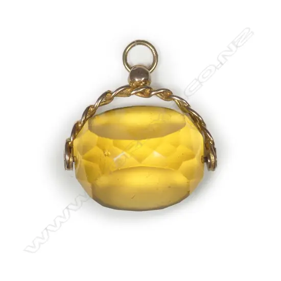 A 9ct yellow gold and faux citrine fob spinner