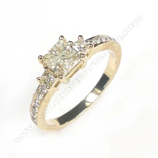 A 14ct gold diamond trilogy ring