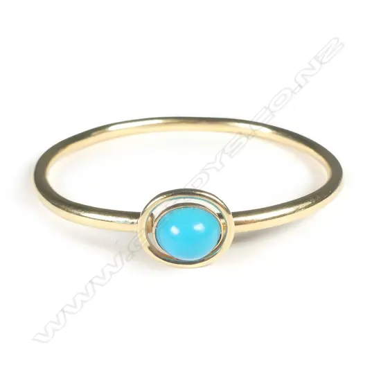 An 18ct gold and turquoise bangle