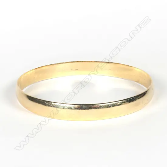 A 9ct gold bangle