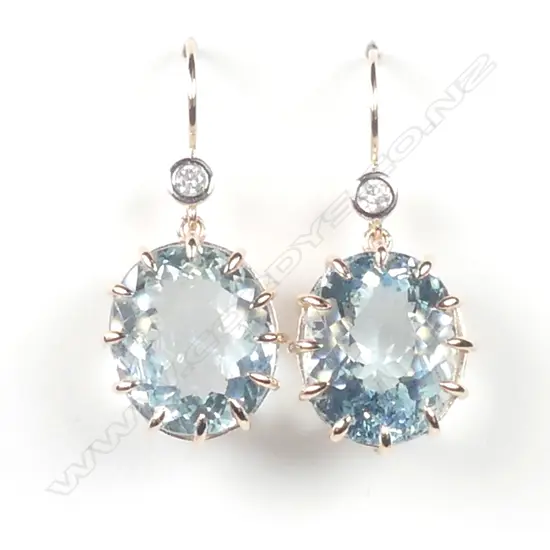 A pair of 14ct rose gold aquamarine and diamond earrings