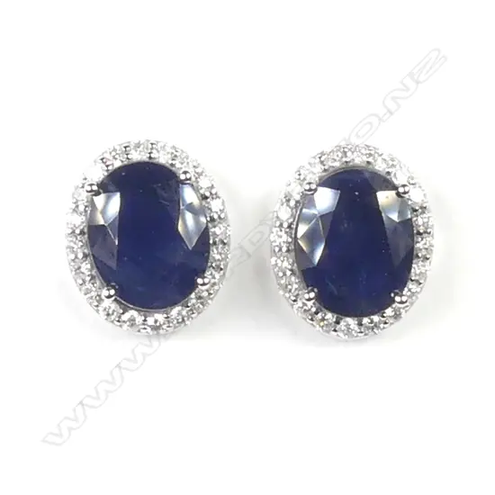 A pair of 14ct white gold sapphire and diamond earrings