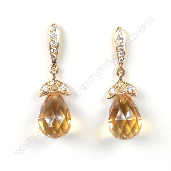 A pair of 18ct rose gold diamond and topaz earrings