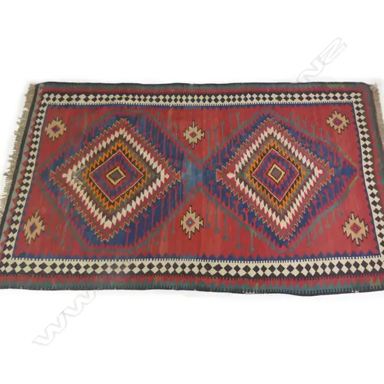 A large vintage Kilim rug