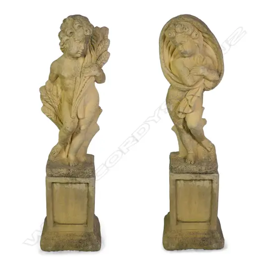 A pair of Church Stone garden statues on plinths