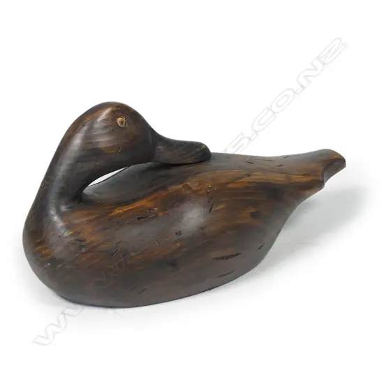 A 12" hand carved duck decoy