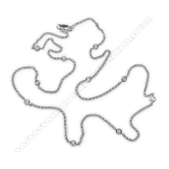 An 18ct. white gold and diamond set necklace