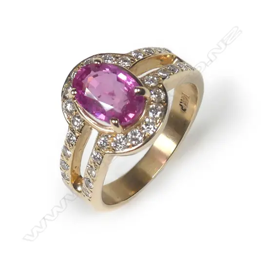 A 14ct gold pink sapphire and diamond ring