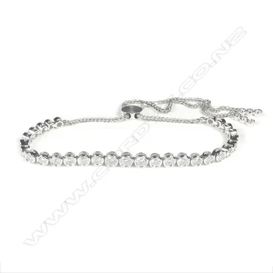 A 14ct white gold diamond bolo bracelet