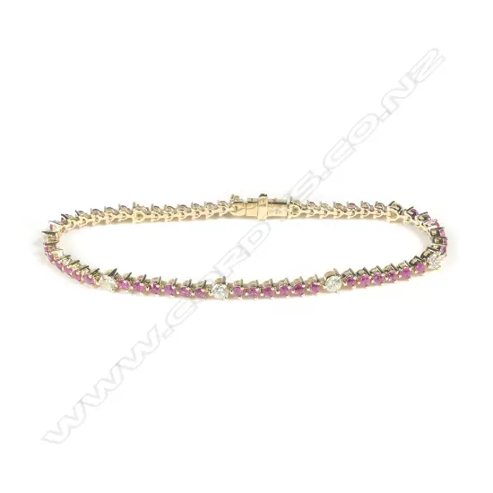 A 14ct gold ruby and diamond bracelet