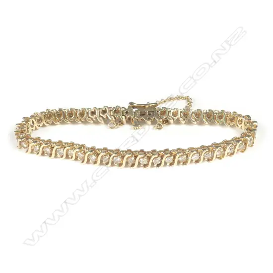 A 14ct gold and diamond bracelet