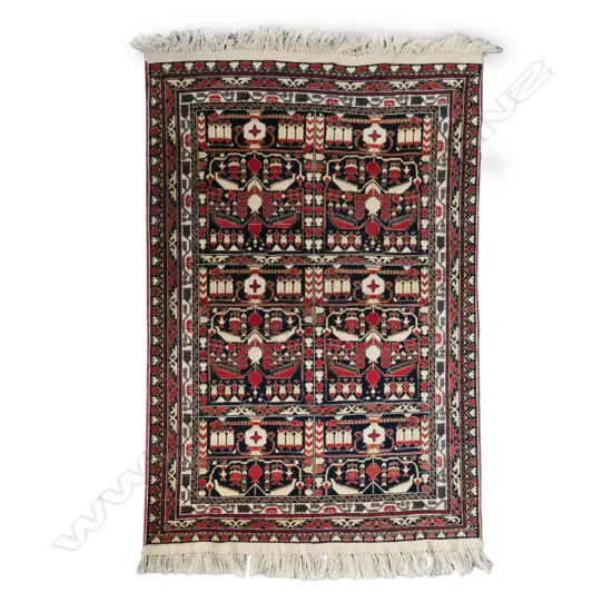 An Iranian hand knotted rug