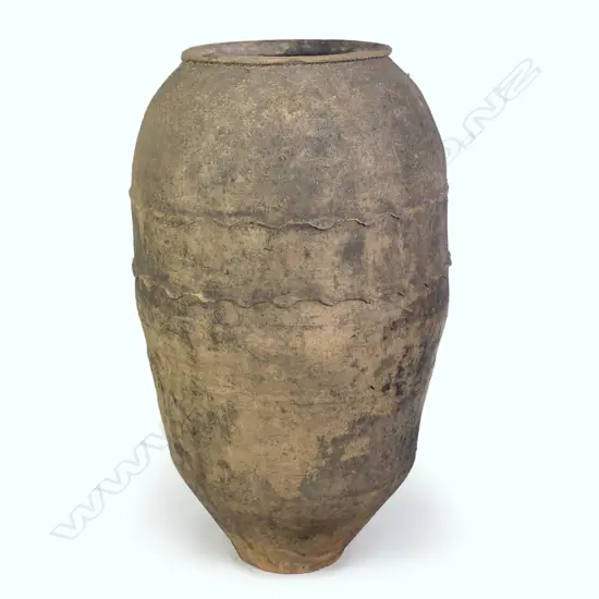 An old Turkish terracotta tall storage jar