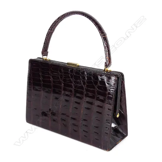 A Bellestone crocodile skin handbag