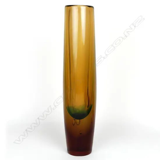 A tall glass vase