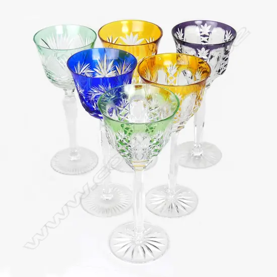 A harlequin set of six coloured long stem cut crystal wine glasses