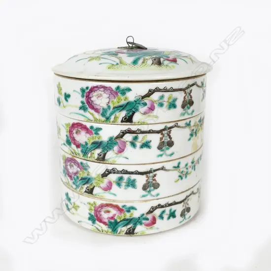A Chinese porcelain four-tier box and cover
