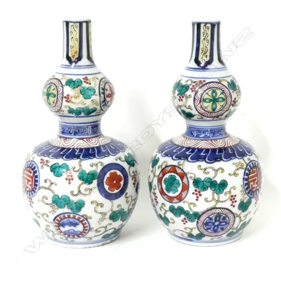A pair of small Chinese porcelain double gourd bottle vases