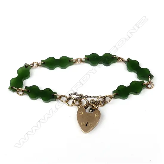 A 9ct. yellow gold and greenstone bracelet