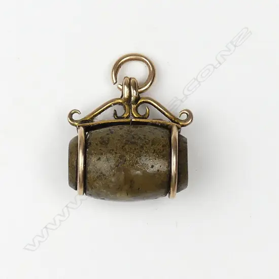 An uncommon New Zealand colonial gold bearing quartz and 9ct. rose gold fob