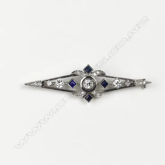 A platinum Art Deco style diamond and sapphire brooch