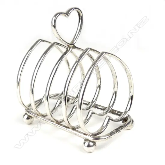A silver four slice toast rack